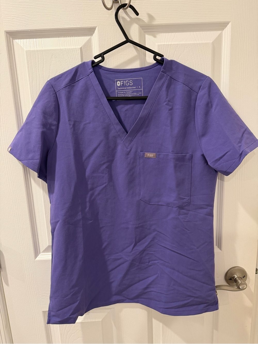 FIGS Woman’s V-Neck Scrub set in Purple
